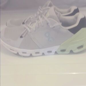 On Running Gray and White Sneakers